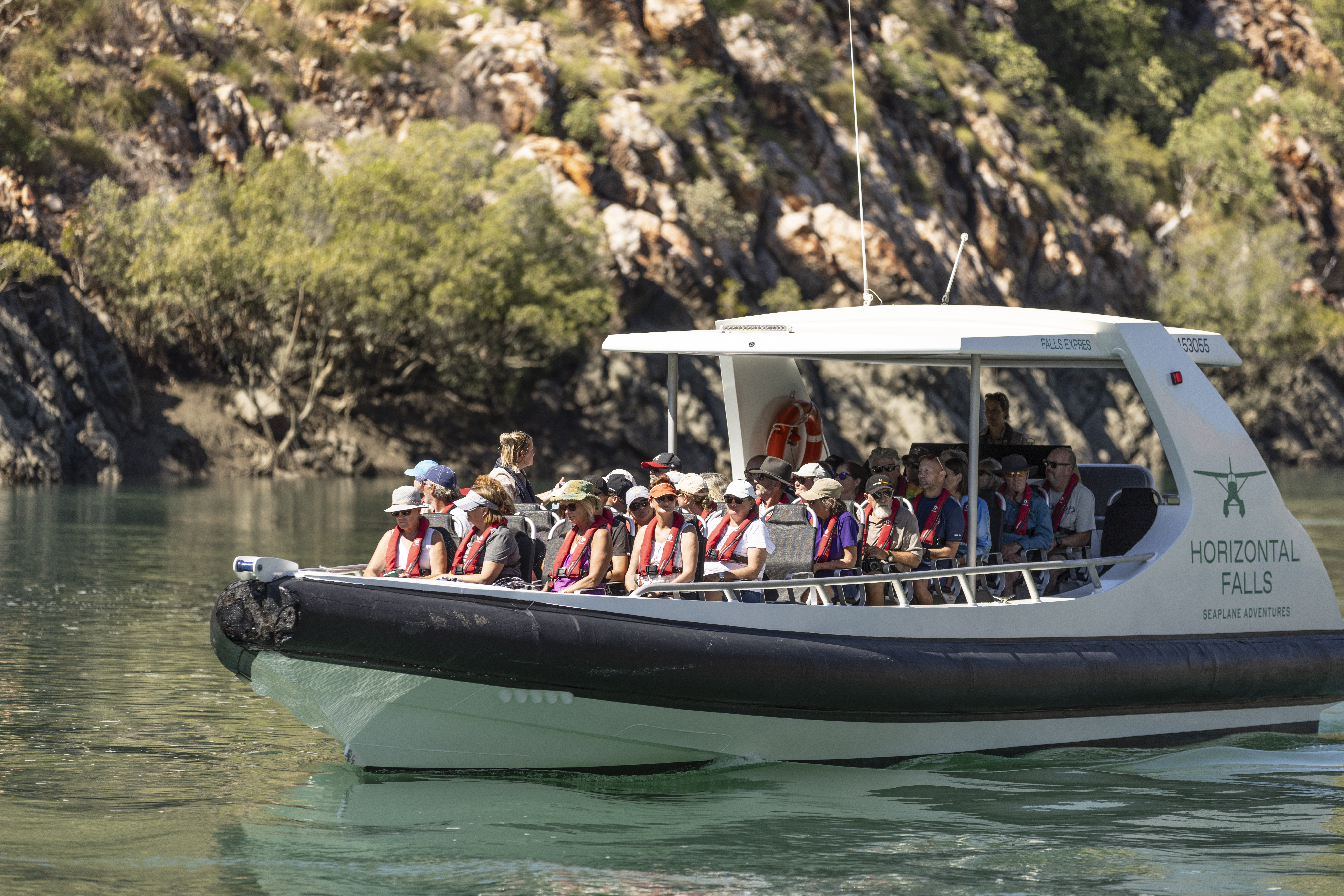 Guests on board a vessel in Talbot Bay going out on a scenic river cruise to spot wildlife.